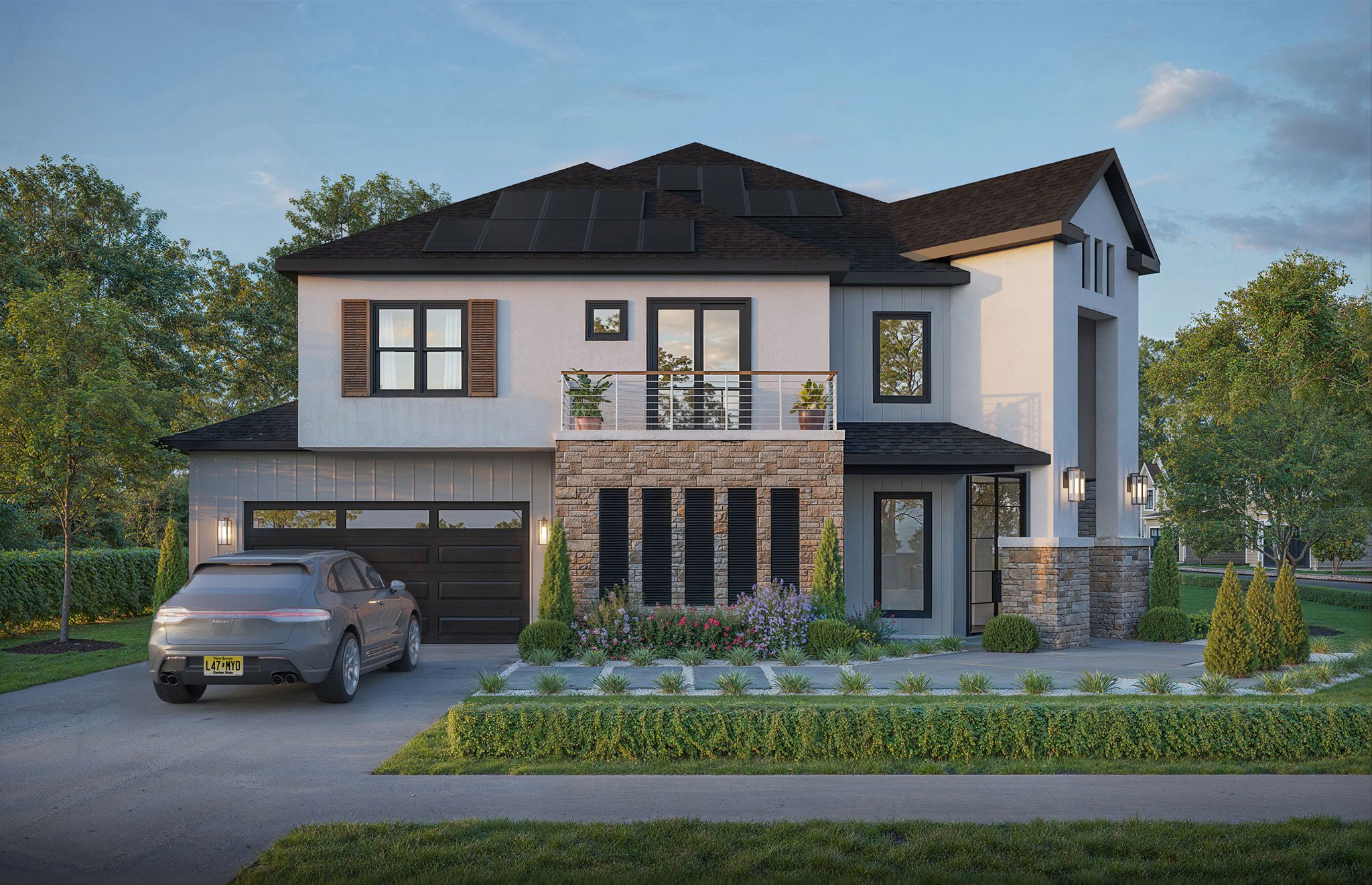 msgamba1-solar1-1 Modern two-story house with solar panels, stone and siding exterior, balcony, and landscaped yard. A car is parked in the driveway.